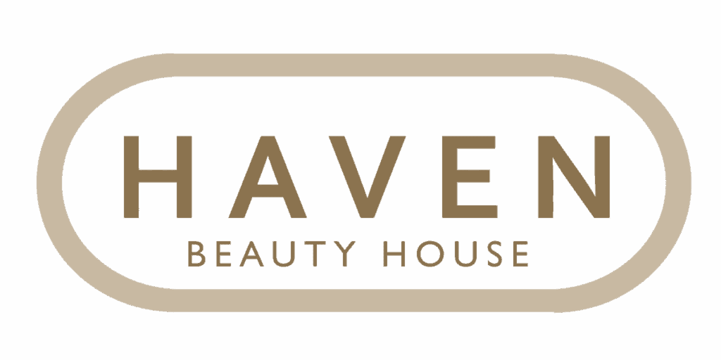 Silhouette of a woman receiving a facial massage at a beauty spa for skincare and relaxation services.